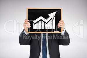 Composite image of businessman showing board