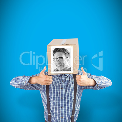 Composite image of businessman with photo box on head