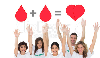 Composite image of group of volunteers raising arms