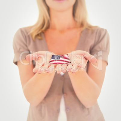 Composite image of happy blonde holding our her hands