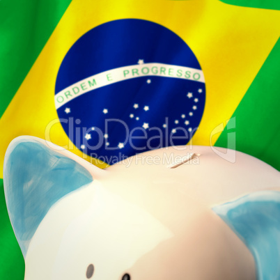 Composite image of piggy bank