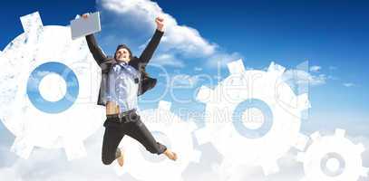 Composite image of cheering businessman