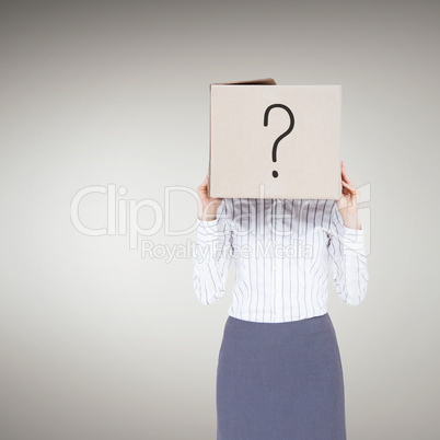 Composite image of businesswoman with box over head