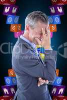 Composite image of businessman with headache