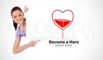 A blood donation sign being pointed at