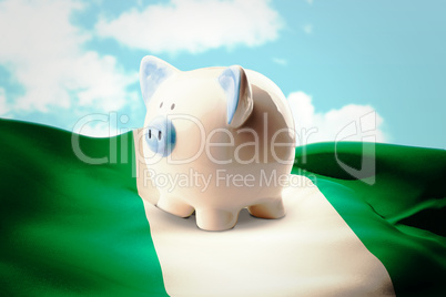 Composite image of piggy bank