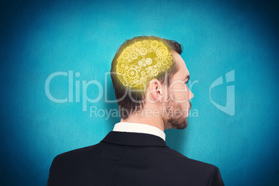 Composite image of elegant businessman in suit thinking