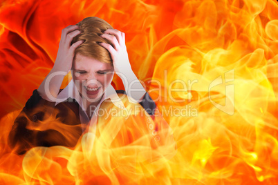 Composite image of stressed businesswoman with hands on her head