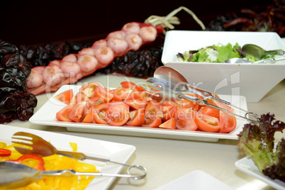 Cut tomatos in the restaurant on Mallorca island, Spain