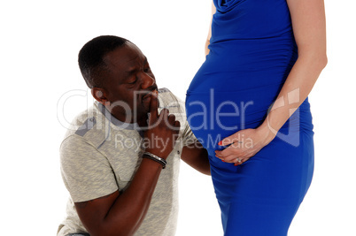 Black man wondering baby belly.