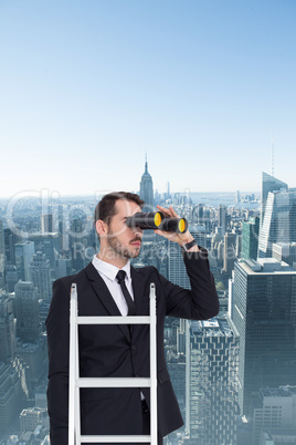 Composite image of businessman looking on a ladder