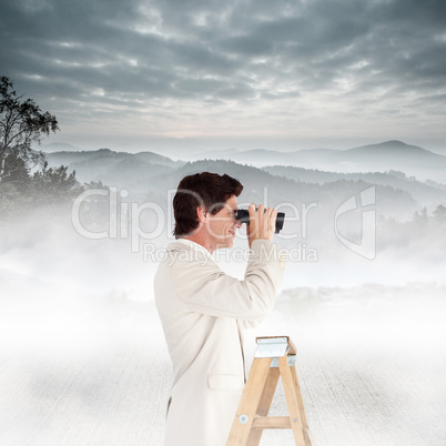 Composite image of businessman looking on a ladder