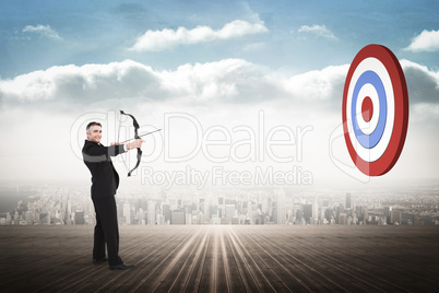 Composite image of smiling businessman drawing a bow