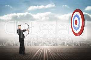 Composite image of smiling businessman drawing a bow