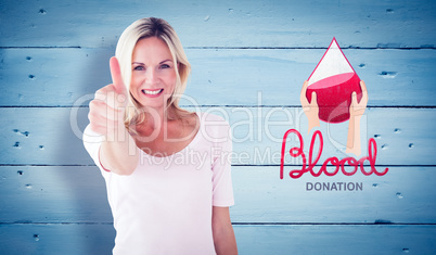 Composite image of happy blonde showing thumbs up and smiling at