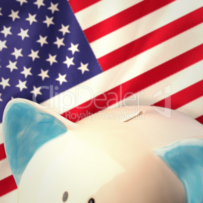 Composite image of piggy bank