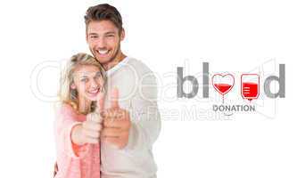 Composite image of attractive couple showing thumbs up to camera