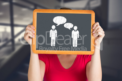 Composite image of woman holding chalkboard over face