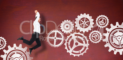Composite image of jumping businessman