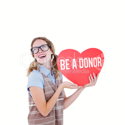 Composite image of geeky hipster woman holding heart card