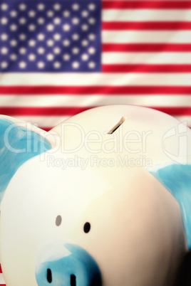 Composite image of piggy bank