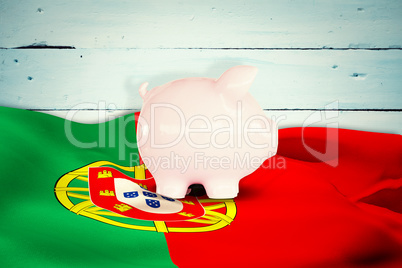 Composite image of piggy bank