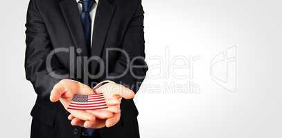 Composite image of mature businessman holding his hands out