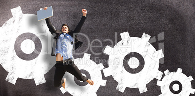 Composite image of cheering businessman