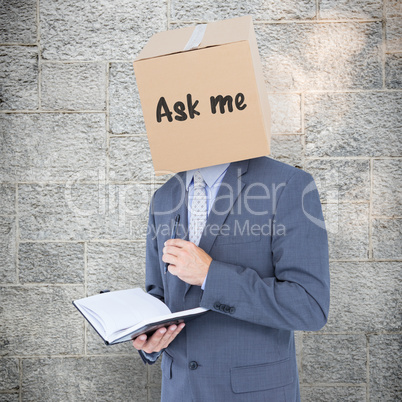 Composite image of anonymous businessman with diary