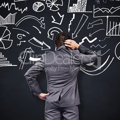 Composite image of thinking businessman scratching head