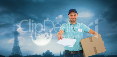 Composite image of delivery man with package giving clipboard fo