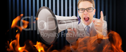 Composite image of geeky businessman shouting through megaphone