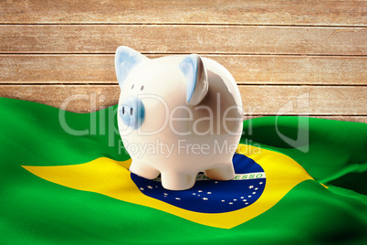 Composite image of piggy bank