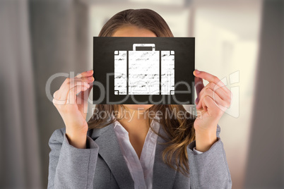 Composite image of businesswoman showing card