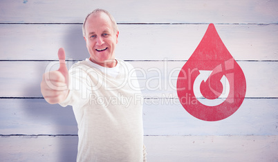 Composite image of happy mature man showing thumbs up to camera