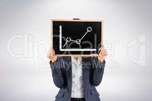 Composite image of businesswoman showing board