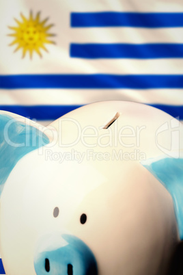 Composite image of piggy bank