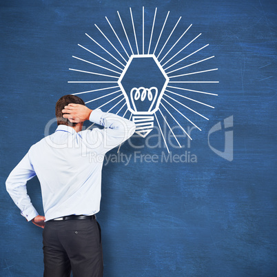 Composite image of thinking businessman scratching head