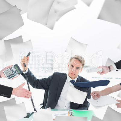 Composite image of businessman in suit offering his hand