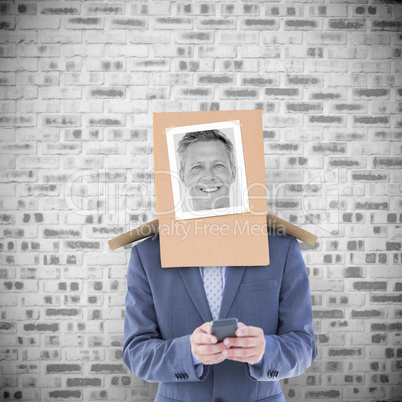 Composite image of businessman with photo box on head