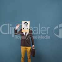 Composite image of businessman with photo box on head