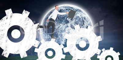 Composite image of happy businessman leaping with his briefcase Composite image of happy businessman leaping with his briefcase