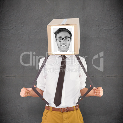 Composite image of businessman with photo box on head