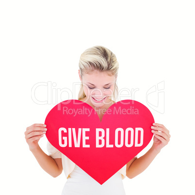 Composite image of attractive young blonde showing red heart
