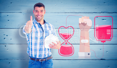 Composite image of confident manual worker gesturing thumbs up