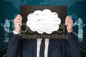 Composite image of businessman holding board