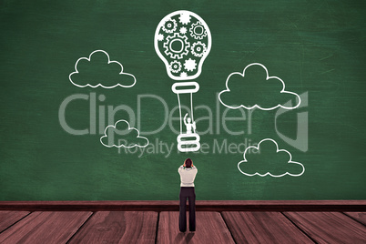 Composite image of businesswoman with hands on head