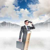 Composite image of businessman looking on a ladder