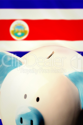 Composite image of piggy bank