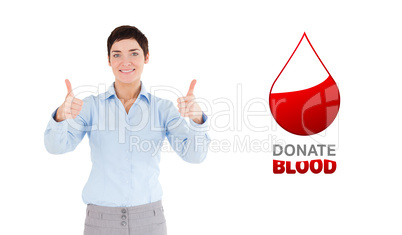 Composite image of businesswoman with the thumbs up